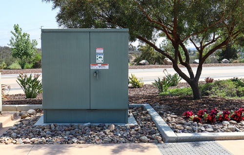 What do pad mounted transformers do, and where are they commonly used?